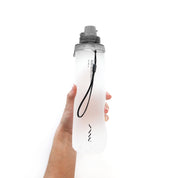 SAAL Surf Rinse 1.2L translucent squeezable portable shower held in hand