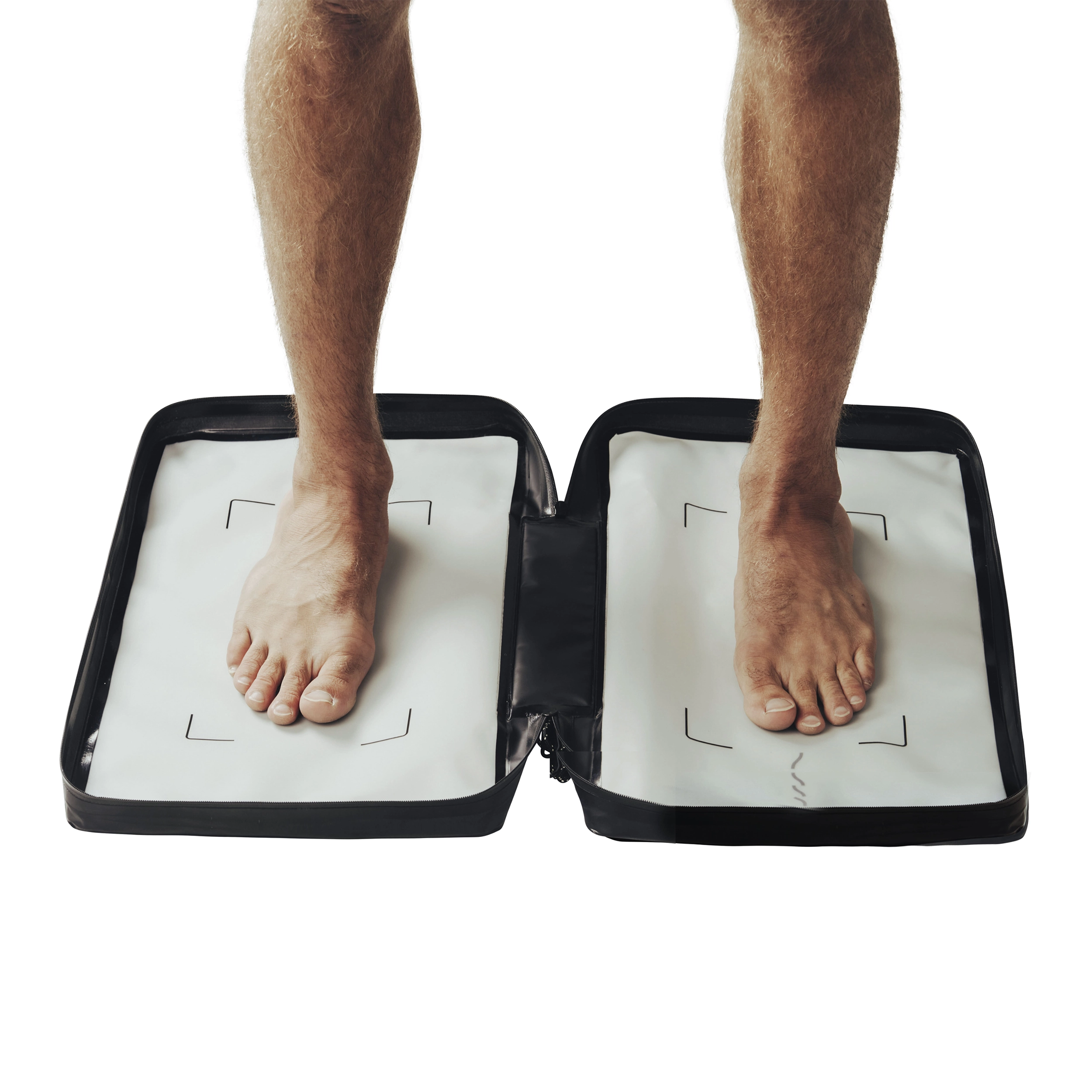 Bare feet standing on the open SAAL Wet Pocket step mat